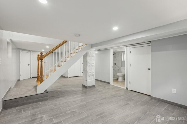 15 Frazer St, Fords, NJ 08863 - finished basement featuring stairway, recessed lighting, and wood finished floors