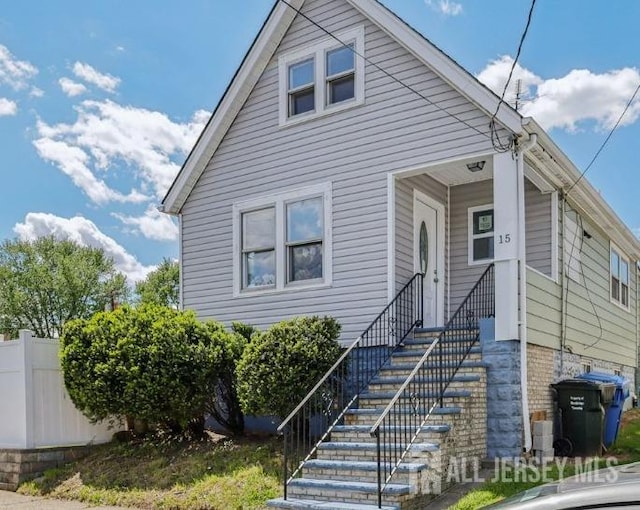 view of front of home with fence