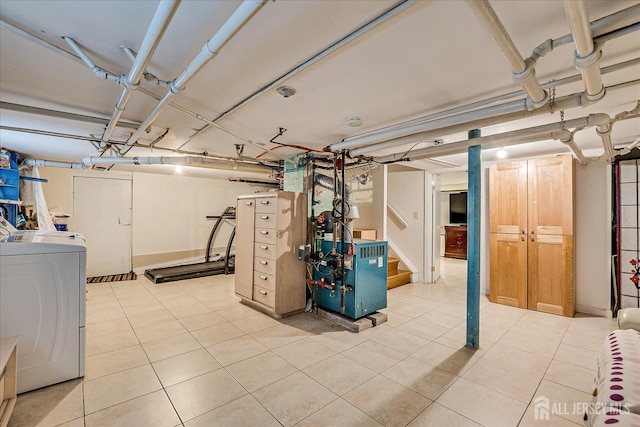 311 Prospect Ave, Dunellen, NJ 08812 - finished basement with washer / dryer, light tile patterned floors, and stairs