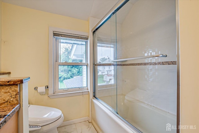 311 Prospect Ave, Dunellen, NJ 08812 - bathroom featuring marble look tiles, shower / bath combination with glass door, and vanity