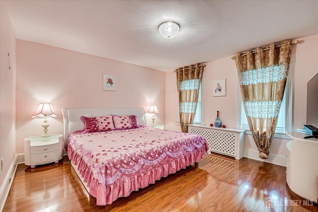 311 Prospect Ave, Dunellen, NJ 08812 - bedroom featuring wood finished floors and baseboards