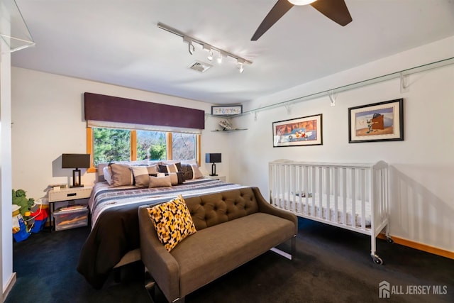 7 Leighton Dr, East Brunswick, NJ 08816 - carpeted bedroom featuring track lighting, ceiling fan, and visible vents