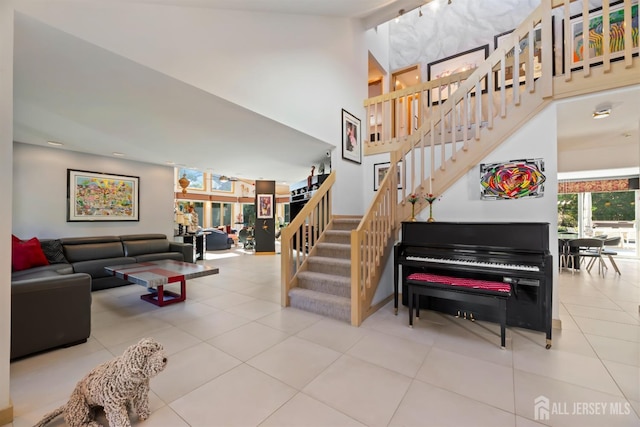 7 Leighton Dr, East Brunswick, NJ 08816 - stairway featuring a towering ceiling and tile patterned flooring