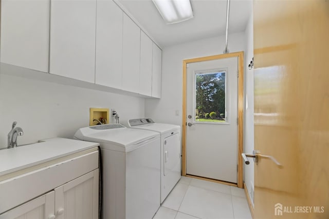7 Leighton Dr, East Brunswick, NJ 08816 - washroom featuring independent washer and dryer, light tile patterned floors, and cabinet space