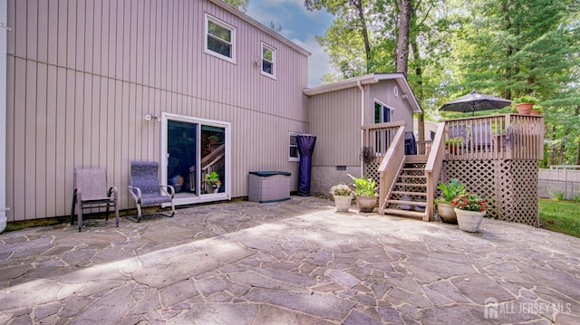 15 Timber Rd, East Brunswick, NJ 08816 - rear view of property with a wooden deck, a patio area, and stairs