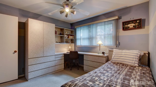 15 Timber Rd, East Brunswick, NJ 08816 - bedroom featuring built in desk, light carpet, and a ceiling fan