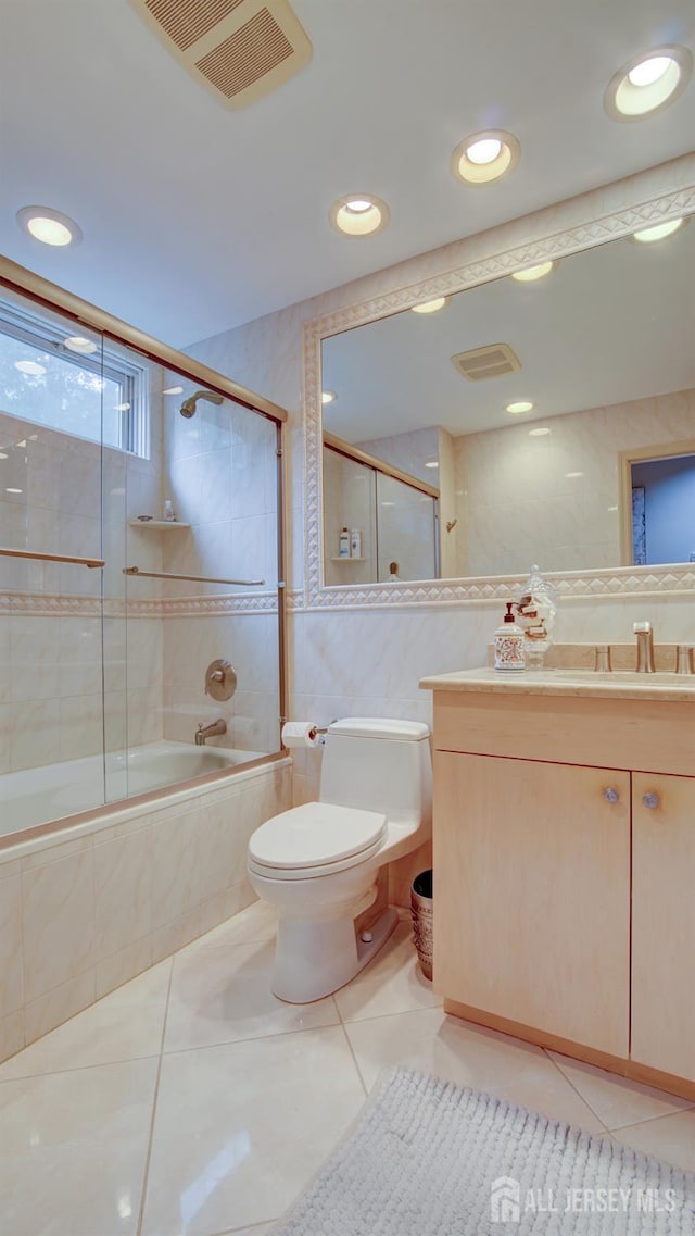 15 Timber Rd, East Brunswick, NJ 08816 - bathroom with tile patterned flooring, tiled shower / bath, tile walls, vanity, and recessed lighting