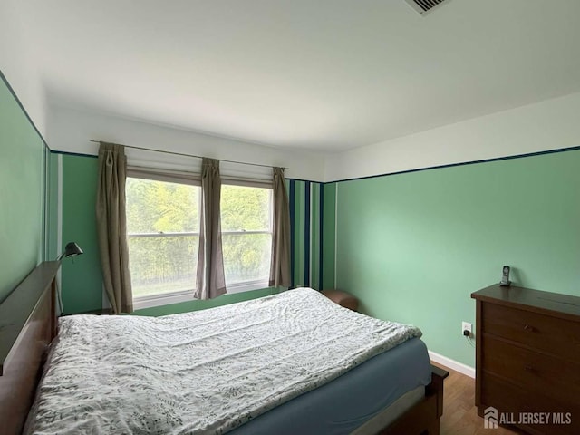 117 Providence Blvd, South Brunswick, NJ 08824 - bedroom with wood finished floors and baseboards