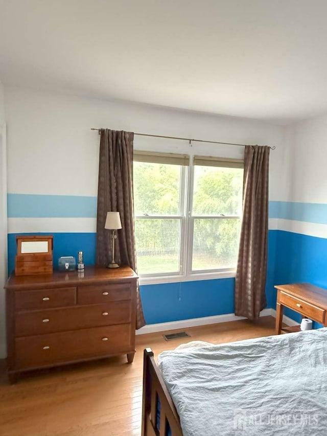 117 Providence Blvd, South Brunswick, NJ 08824 - bedroom with light wood finished floors and baseboards