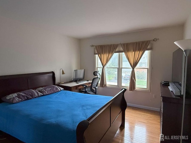 117 Providence Blvd, South Brunswick, NJ 08824 - bedroom with light wood-style floors and an office area