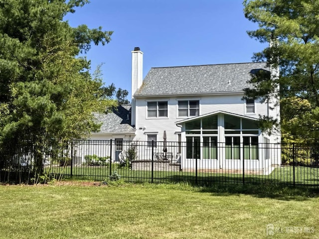 117 Providence Blvd, South Brunswick, NJ 08824 - back of property featuring a sunroom, a chimney, and roof with shingles
