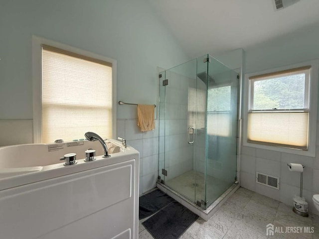 117 Providence Blvd, South Brunswick, NJ 08824 - full bath featuring a shower stall, a garden tub, and tile walls