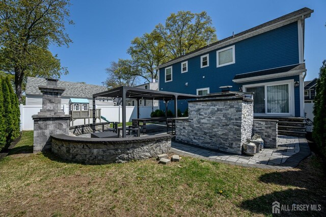 328 Coolidge Dr, Kenilworth, NJ 07033 - back of property featuring a patio area and a gazebo