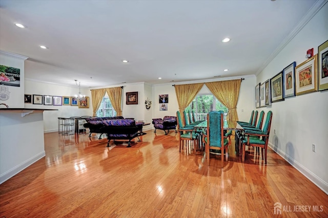 7102 Falston Cir, Old Bridge, NJ 08857 - playroom featuring light wood-style flooring, ornamental molding, healthy amount of natural light, recessed lighting, and a chandelier