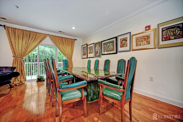 7102 Falston Cir, Old Bridge, NJ 08857 - dining area with light wood-type flooring, ornamental molding, and recessed lighting