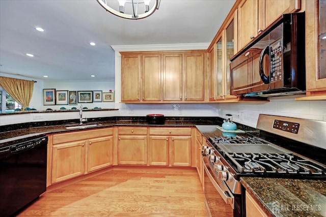7102 Falston Cir, Old Bridge, NJ 08857 - kitchen with black appliances, dark stone counters, light wood-style flooring, glass insert cabinets, and recessed lighting