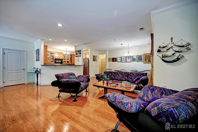 7102 Falston Cir, Old Bridge, NJ 08857 - living area with a chandelier, light wood finished floors, and recessed lighting
