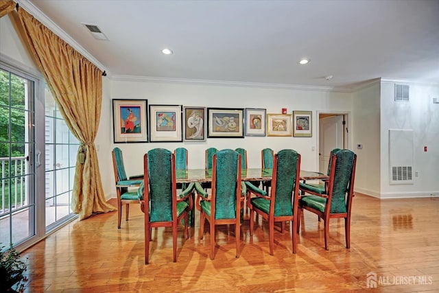 7102 Falston Cir, Old Bridge, NJ 08857 - dining area featuring light wood finished floors, ornamental molding, and recessed lighting
