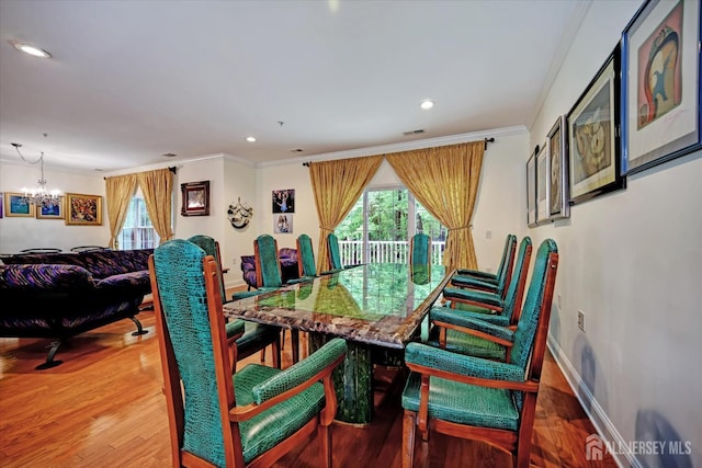 7102 Falston Cir, Old Bridge, NJ 08857 - dining room featuring a chandelier, healthy amount of natural light, crown molding, wood finished floors, and recessed lighting