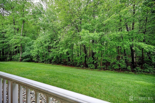 7102 Falston Cir, Old Bridge, NJ 08857 - view of grassy yard with a wooded view