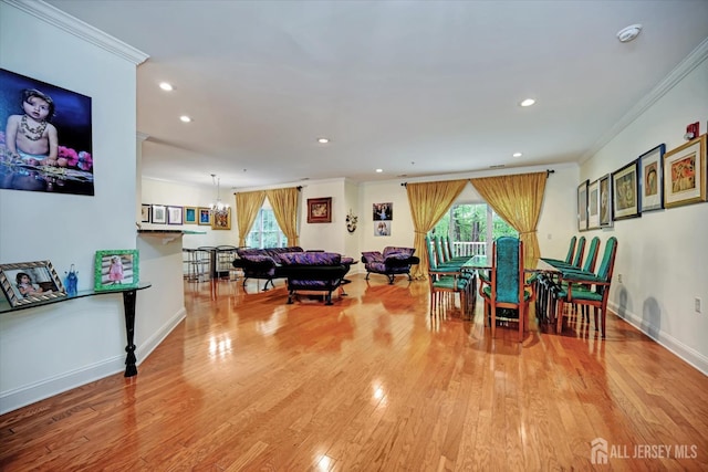 7102 Falston Cir, Old Bridge, NJ 08857 - dining room with crown molding, recessed lighting, light wood-style floors, and plenty of natural light