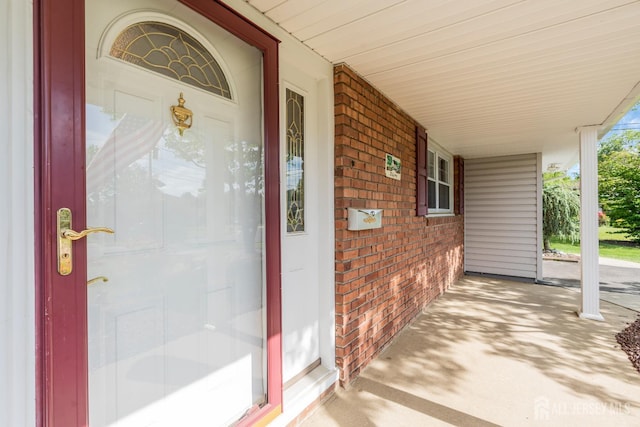 11 Diana Ct, East Brunswick, NJ 08816 - entrance to property with brick siding and a porch