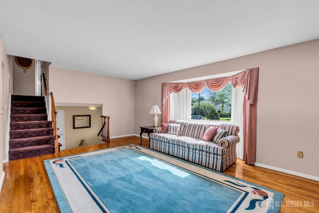 11 Diana Ct, East Brunswick, NJ 08816 - living area featuring wood finished floors, baseboards, and stairs