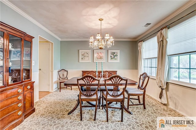 13 Harper Rd, South Brunswick, NJ 08852 - dining room with a chandelier, ornamental molding, and wainscoting