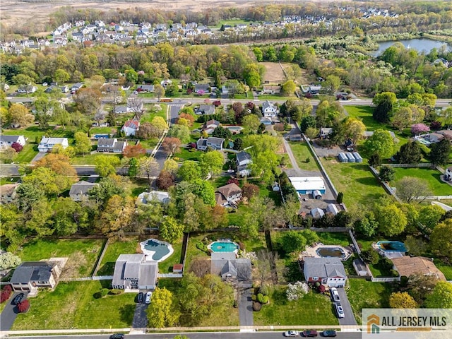 13 Harper Rd, South Brunswick, NJ 08852 - aerial overview of property's location with nearby suburban area and a nearby body of water