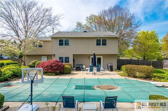 13 Harper Rd, South Brunswick, NJ 08852 - view of swimming pool featuring a patio area, fence, a covered pool, and a diving board