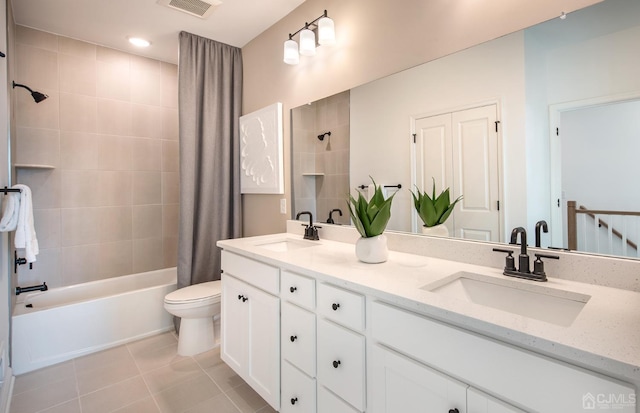 full bath featuring visible vents, a sink, shower / bathtub combination with curtain, and tile patterned flooring
