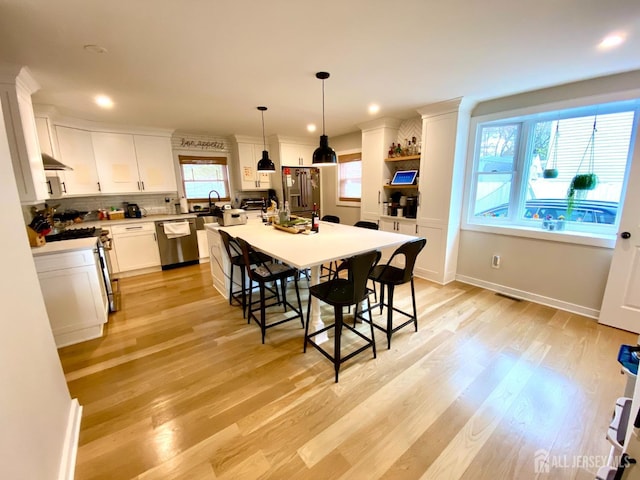 22 E Zoller Rd, East Brunswick, NJ 08816 - dining space with light wood finished floors, recessed lighting, and baseboards