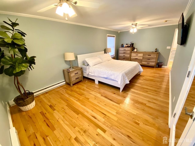 22 E Zoller Rd, East Brunswick, NJ 08816 - bedroom featuring a baseboard heating unit, crown molding, light wood finished floors, ceiling fan, and baseboards