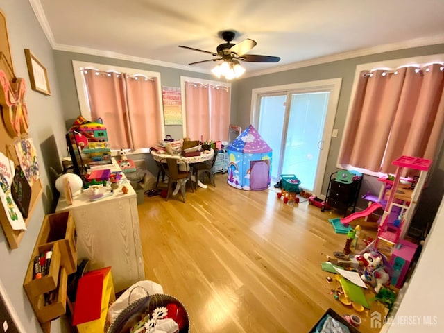 22 E Zoller Rd, East Brunswick, NJ 08816 - game room featuring wood finished floors, crown molding, and ceiling fan