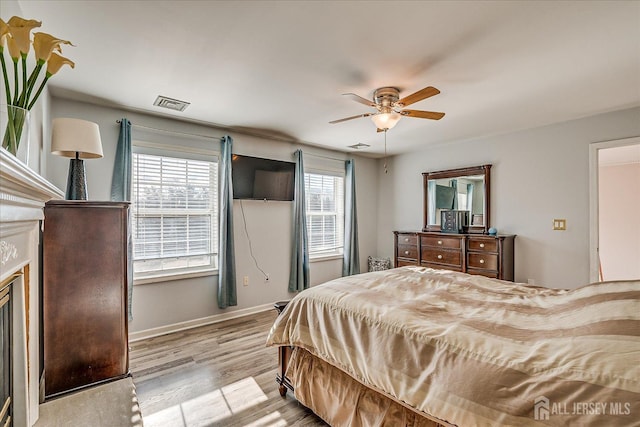 74 Gates Rd, Franklin, NJ 08873 - bedroom with a ceiling fan, baseboards, visible vents, and light wood-style flooring