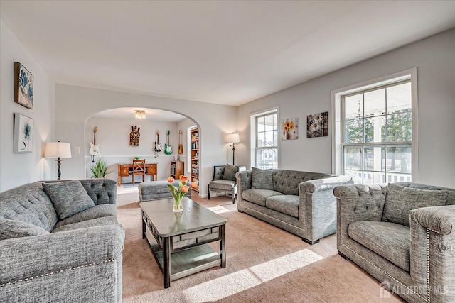 74 Gates Rd, Franklin, NJ 08873 - living room with arched walkways and light colored carpet