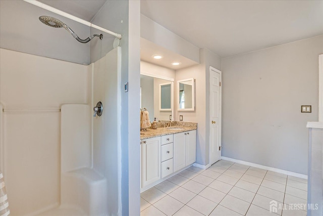 74 Gates Rd, Franklin, NJ 08873 - bathroom with vanity, tile patterned floors, baseboards, and a shower