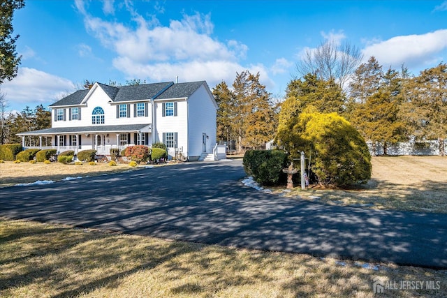 view of front of home featuring covered porch