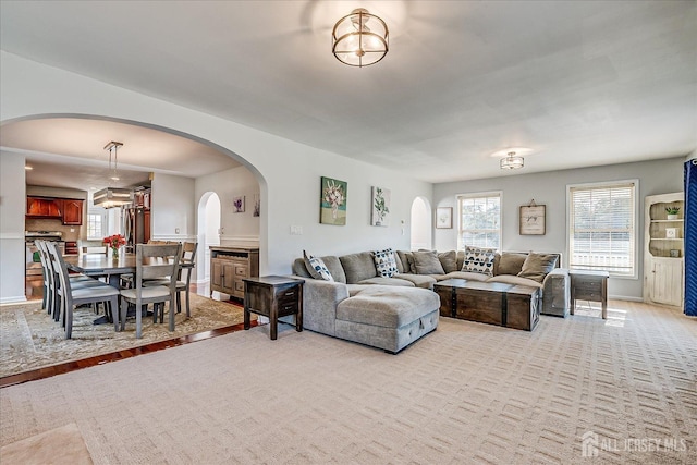 74 Gates Rd, Franklin, NJ 08873 - living room with arched walkways and light colored carpet