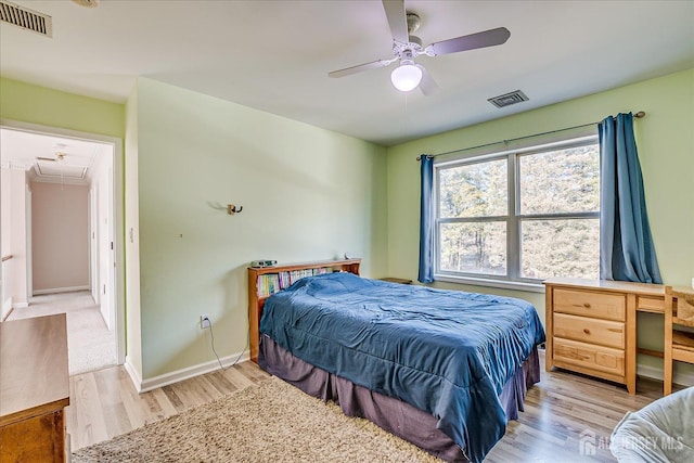 74 Gates Rd, Franklin, NJ 08873 - bedroom with baseboards, attic access, wood finished floors, and visible vents