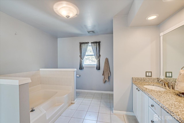 74 Gates Rd, Franklin, NJ 08873 - bathroom featuring a garden tub, visible vents, vanity, baseboards, and tile patterned floors