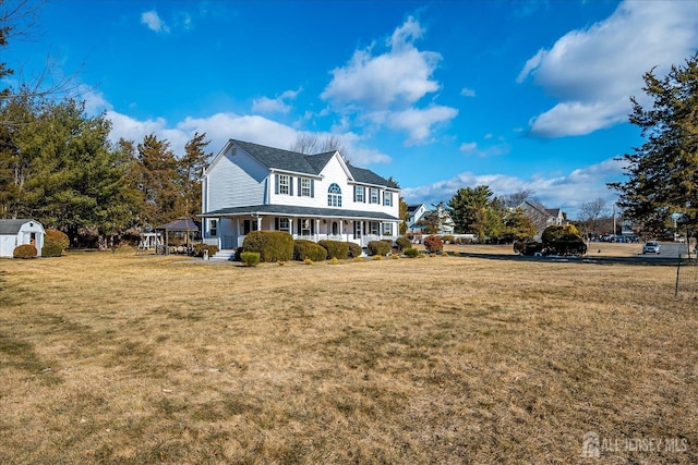 74 Gates Rd, Franklin, NJ 08873 - exterior space with a storage shed, an outdoor structure, covered porch, and a front yard