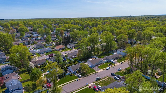 15 E Grant Ave, Colonia, NJ 07067 - aerial perspective of suburban area featuring a heavily wooded area