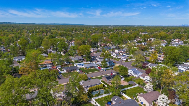 15 E Grant Ave, Colonia, NJ 07067 - aerial overview of property's location featuring nearby suburban area and a forest