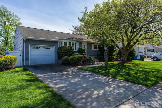 15 E Grant Ave, Colonia, NJ 07067 - ranch-style home featuring an attached garage, concrete driveway, and a shingled roof