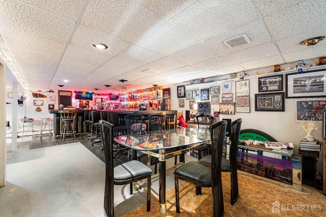 15 E Grant Ave, Colonia, NJ 07067 - dining space with a bar and a paneled ceiling