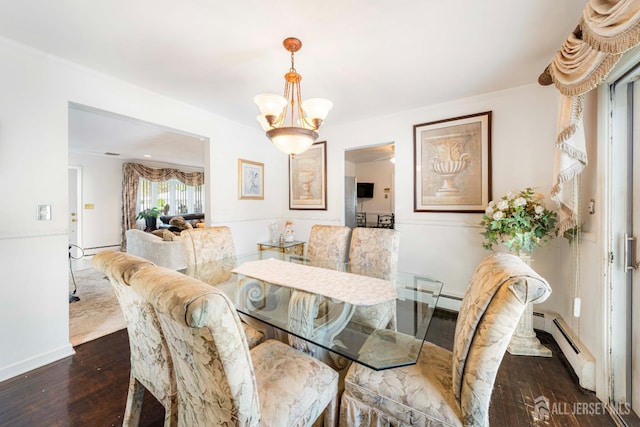15 E Grant Ave, Colonia, NJ 07067 - dining area with a baseboard heating unit, wood-type flooring, and a chandelier