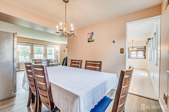 40 Azalea Dr, Edison, NJ 08820 - dining space with a chandelier, healthy amount of natural light, and wood finished floors
