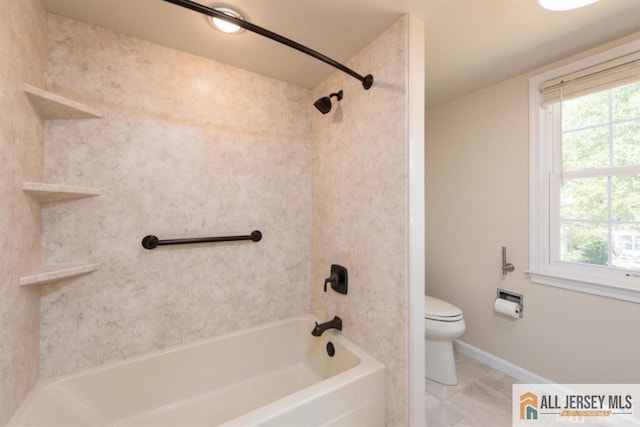 bathroom with shower / bath combination, baseboards, a healthy amount of sunlight, and toilet