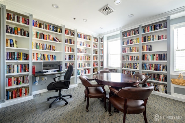 236 Valencia Dr, Monroe, NJ 08831 - interior space featuring wall of books, visible vents, baseboards, ornamental molding, and carpet floors